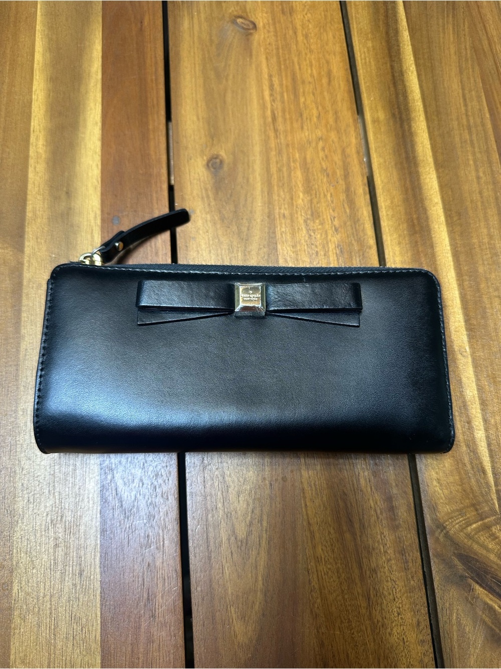 kate spade Nisha Smooth Black Leather Zip Wallet with Bow and Hot Pink Interior